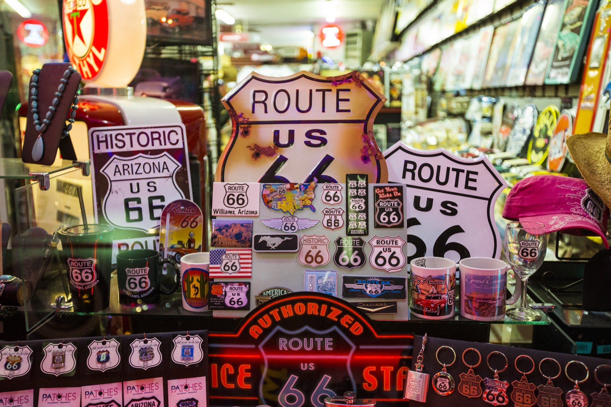 Route 66 memorabilia crowding a souvenir shop window