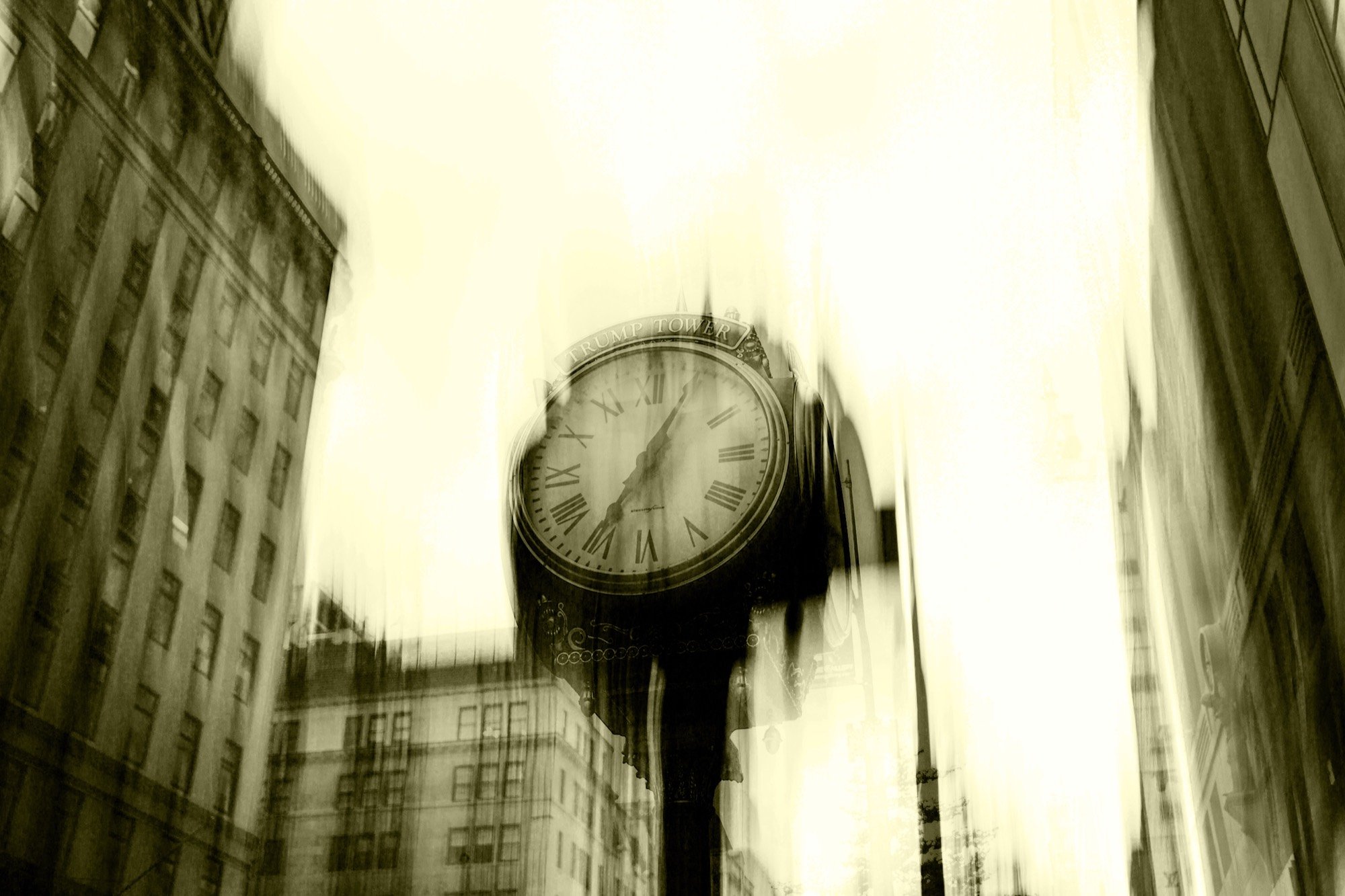 A street clock blurred in motion