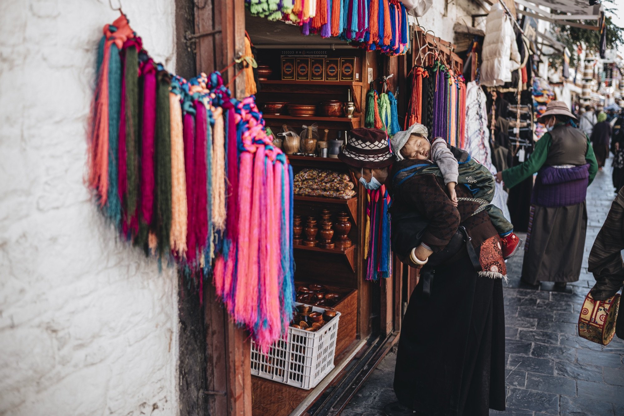 A colorful market stall vendor